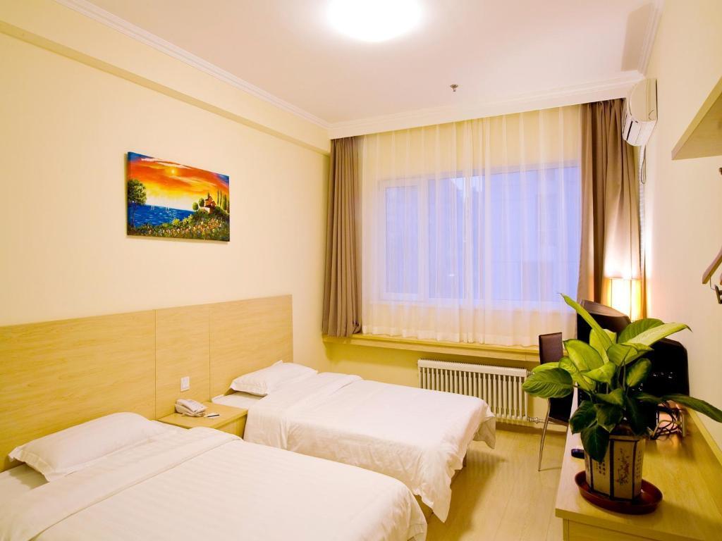 Haitian E Inn Qingdao Rom bilde